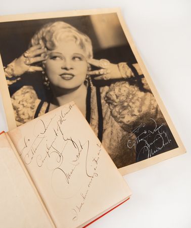 Lot #761 Mae West (2) Signed Items - Book and Oversized Photograph - Image 1