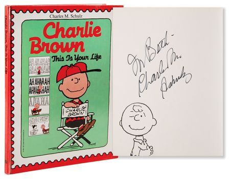 Lot #461 Charles Schulz Signed Book - Charlie Brown: This Is Your Life - Image 1