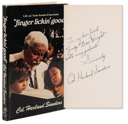 Lot #252 Col. Harland Sanders Signed Book - Finger Lickin' Good - Image 1