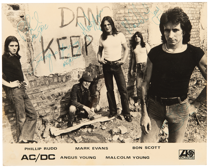 Lot 708 AC/DC Early Signed Publicity Photograph (ca. 1976)