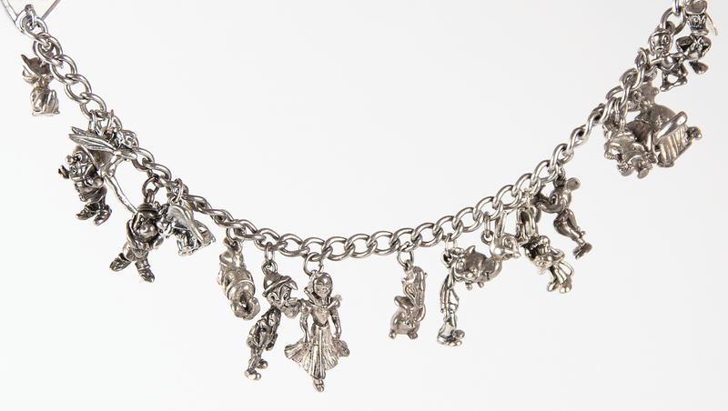 Lot 345 Roy O. Disney Sterling Silver Charm (17) Bracelet - Presented to a Veteran Member of Disney?s Ink and Paint Department