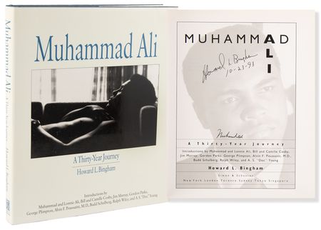 Lot #915 Muhammad Ali Signed Book - A Thirty Year Journey - Image 1