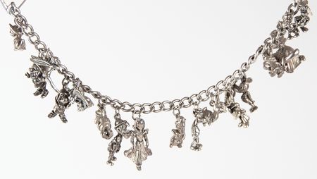 Lot #345 Roy O. Disney Sterling Silver Charm (17) Bracelet - Presented to a Veteran Member of Disney?s Ink and Paint Department - Image 1