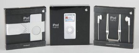 Lot #6082 Apple iPod Nano (1st Generation, Sealed - 2GB, White), with Lanyard Headphones and Armband - Image 1