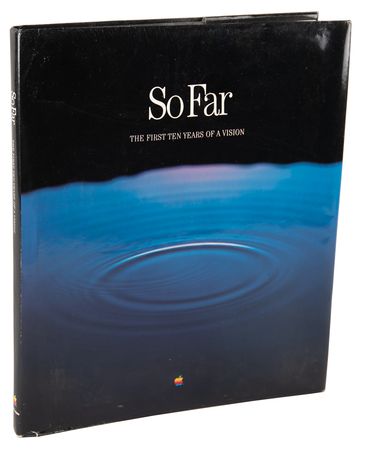 Lot #6119 Apple 10-Year Anniversary Book - So Far: The First Ten Years of a Vision with Calendar, Keychains, and 'Apple Boogie' Cassette Tape - Image 1