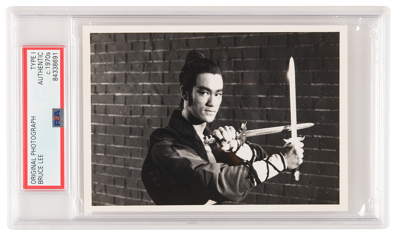 Lot 562 Bruce Lee Original Photograph as the 'Blind Swordsman' - PSA Type I