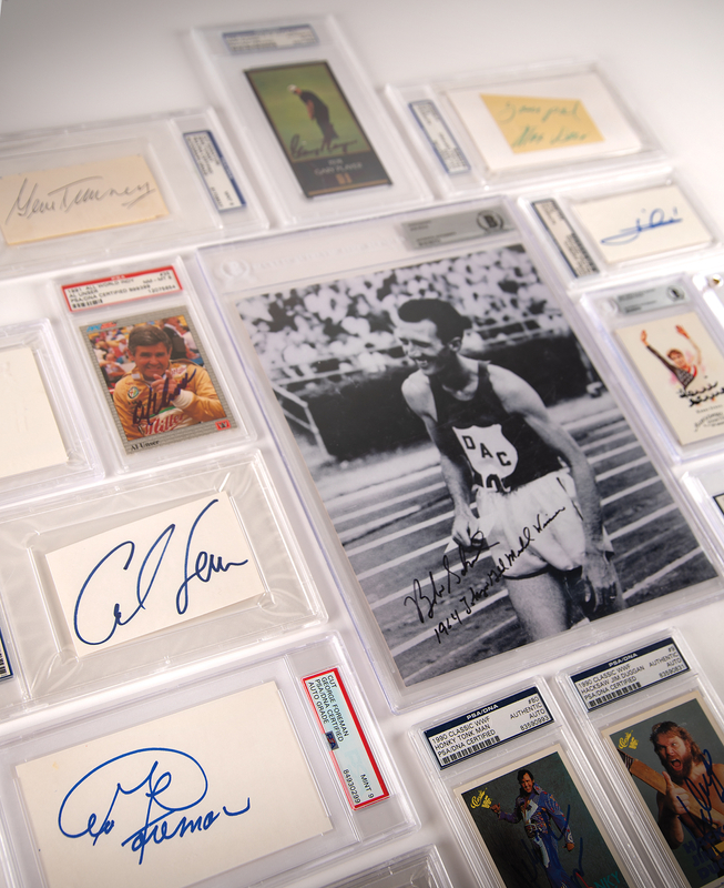 Lot 766 Sports (16) Autographs with Mario Andretti, George Foreman, and Carl Lewis