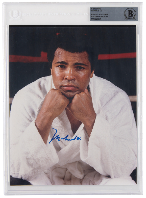 Lot 674 Muhammad Ali Signed Photograph - BAS 10