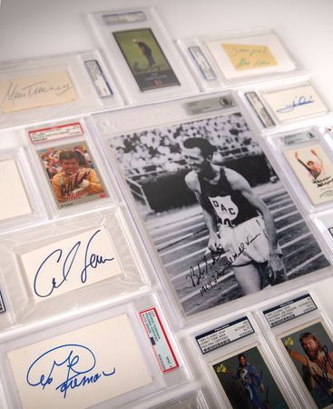 Lot #766 Sports (16) Autographs with Mario Andretti, George Foreman, and Carl Lewis - Image 1