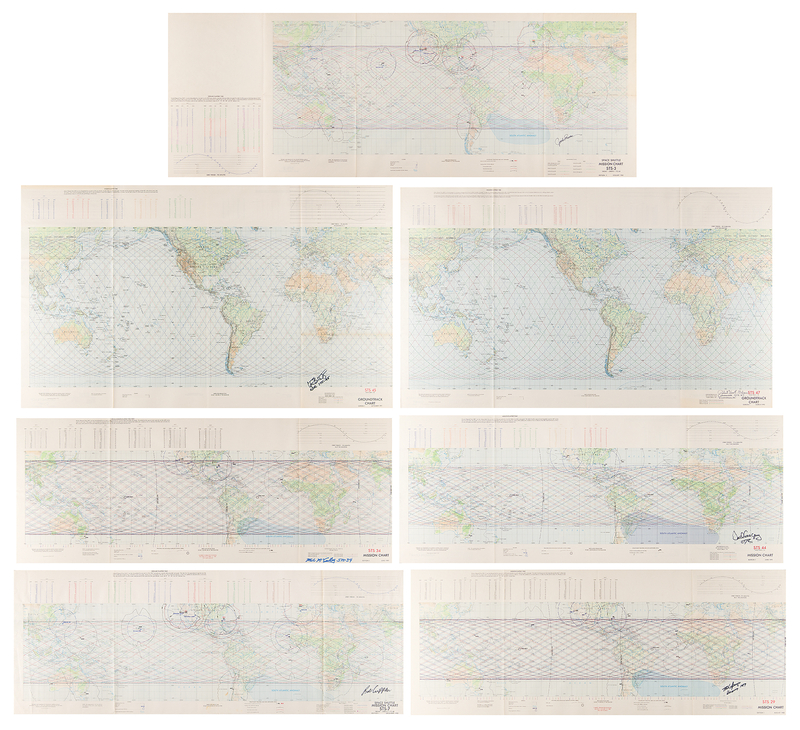 Lot 8555 Space Shuttle Mission and Groundtrack Charts (7) Signed by Astronauts, with Crippen, Lousma, and Springer