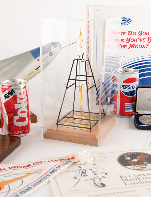 Lot 8606 Space Archive of S. Neil Hosenball, NASA's General Counsel, with Flown Flags, Certificates, 'Space Cans,' and a Rare 'Goddard Space Flight Center' Rocket Model