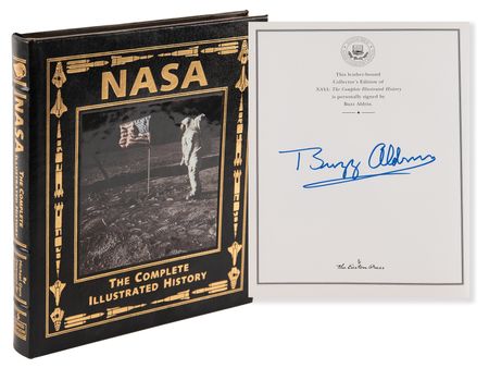 Lot #8218 Buzz Aldrin Signed Book - NASA: The Complete Illustrated History - Image 1