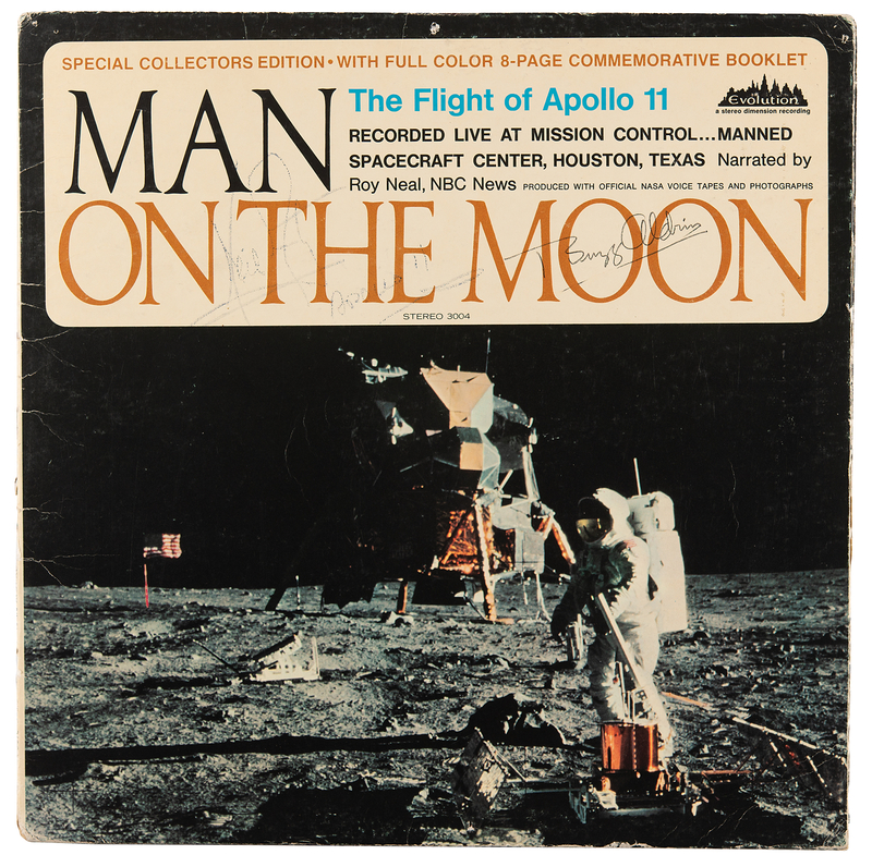 Lot 513 Apollo 11: Neil Armstrong and Buzz Aldrin Signed Album - Man on the Moon: The Flight of Apollo 11