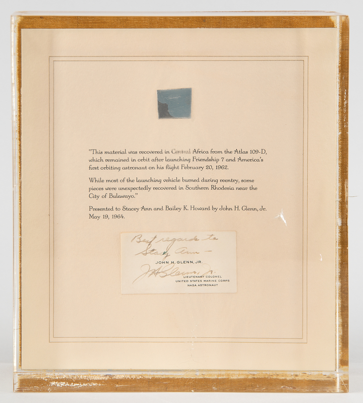Lot 545 Friendship 7: Atlas 109D Flown Metal Fragment Display with Presentation Card Signed by John Glenn