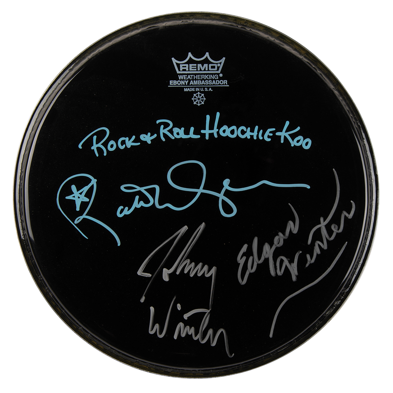 Lot 795 Johnny Winter, Edgar Winter, and Rick Derringer Signed Drum Head