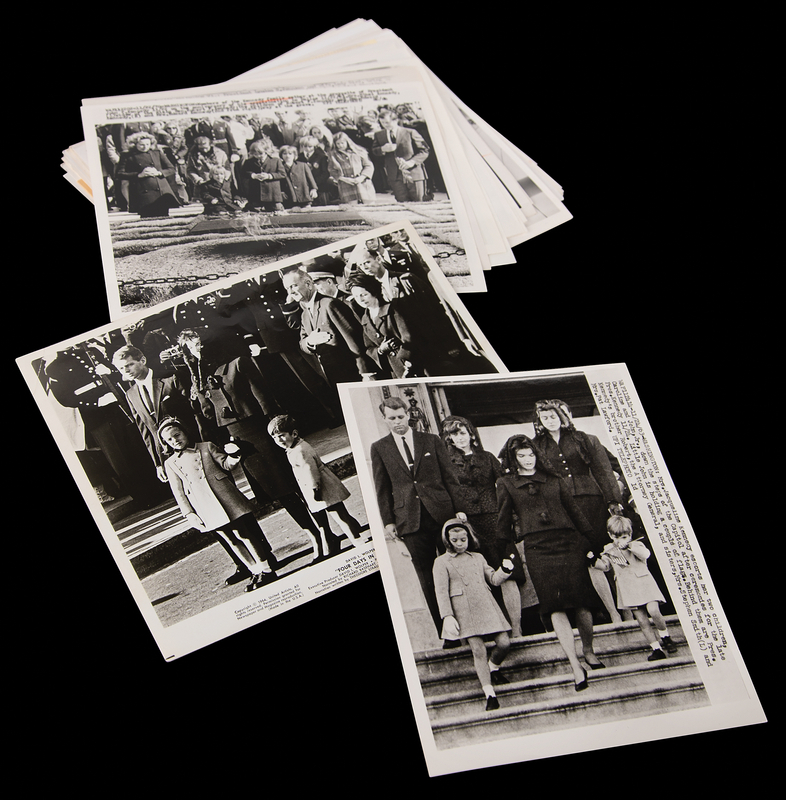 Lot 150 John F. Kennedy Funeral and Memorials Archive of (38) Press Photographs