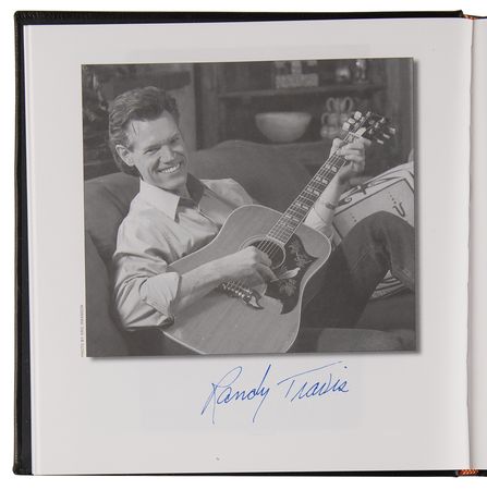 Lot #640 Western Legends Multi-Signed Book (40+) with Adam West, Mickey Rooney, Brooks and Dunn, and Sam Elliott - Image 4