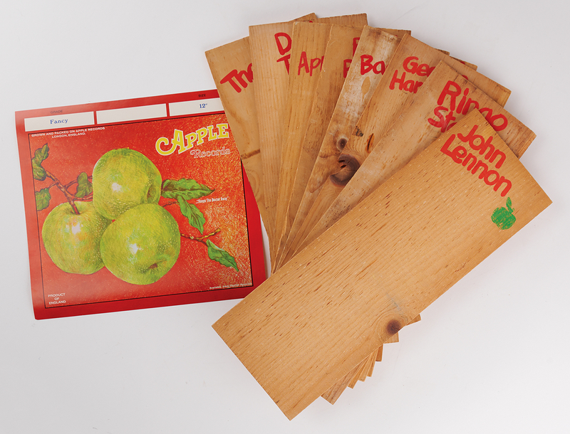 Lot 450 Beatles: Apple Crate Label and (8) Artist Dividers, Including John Lennon, George Harrison, and Ringo Starr