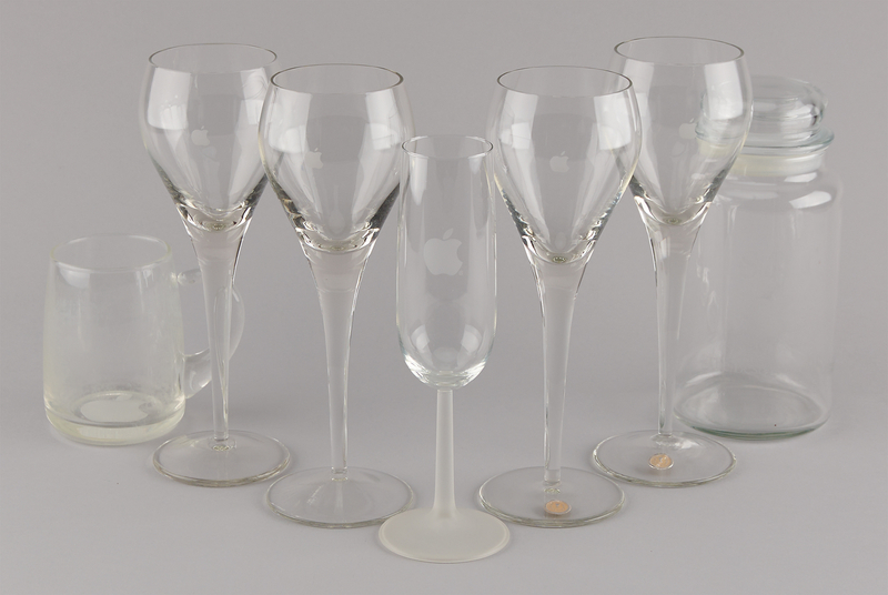 Lot 6136 Apple Computer Glassware - Champagne and Wine Glasses, Beer Mug, and IS&T Jar