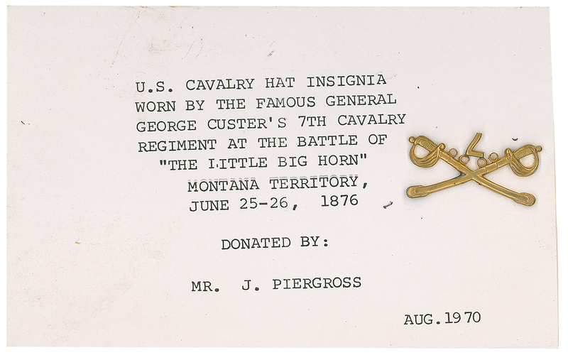 Lot 475 [George A. Custer] 7th Cavalry Hat Insignia