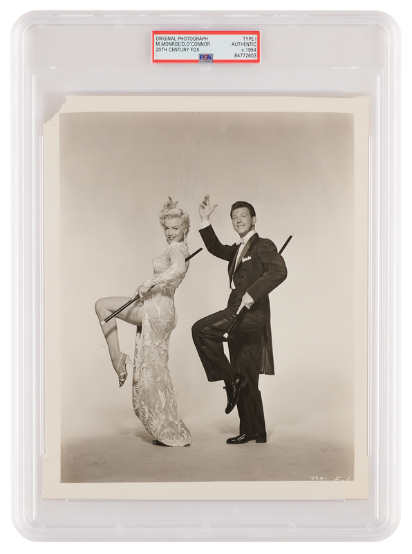 Lot 772 Marilyn Monroe and Donald O'Connor Original Photograph - PSA Type I