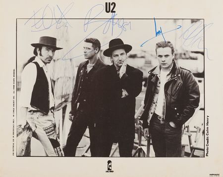 Lot #637 U2 Signed Photograph - Image 1