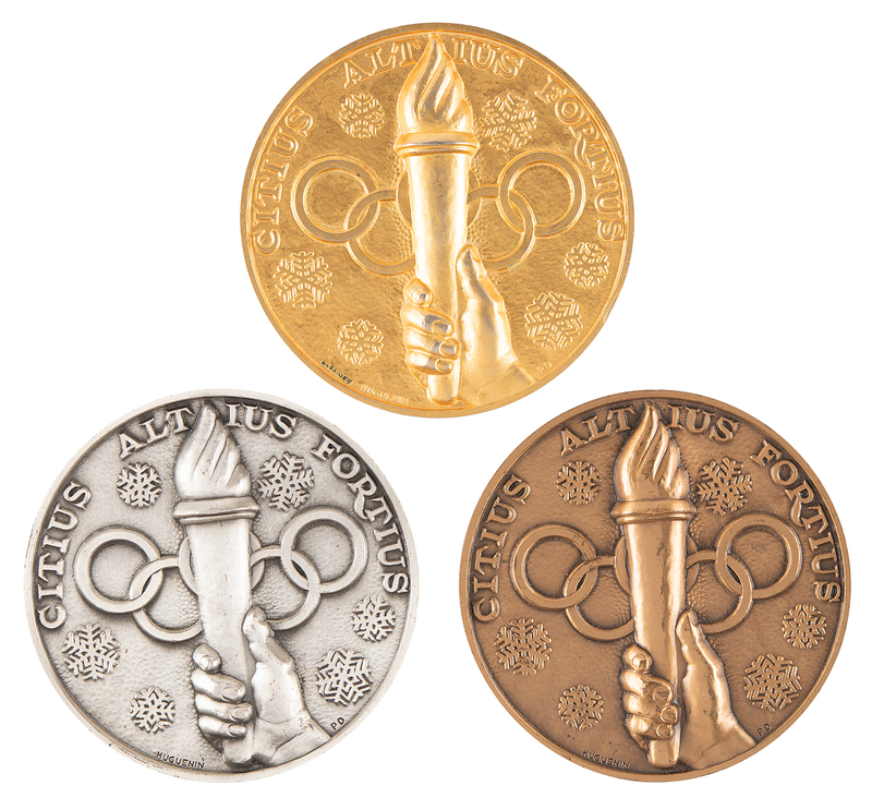 Lot 3072 St. Moritz 1948 Winter Olympics Collection of (3) Winner's Medals: Gold, Silver, and Bronze