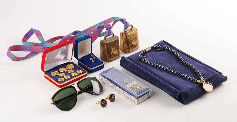 Lot 3341 Olympic Lot of (19) Commemorative Items (Sunglasses, Bells, Pins, and More) - From the Collection of IOC Member James Worrall