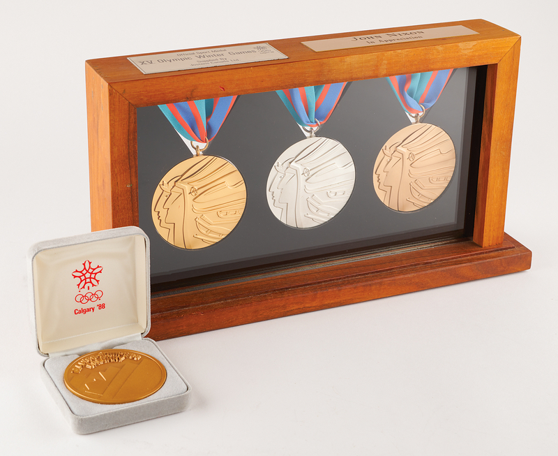 Lot 3092 Calgary 1988 Winter Olympics Gold, Silver, and Bronze Winners' Medals Display