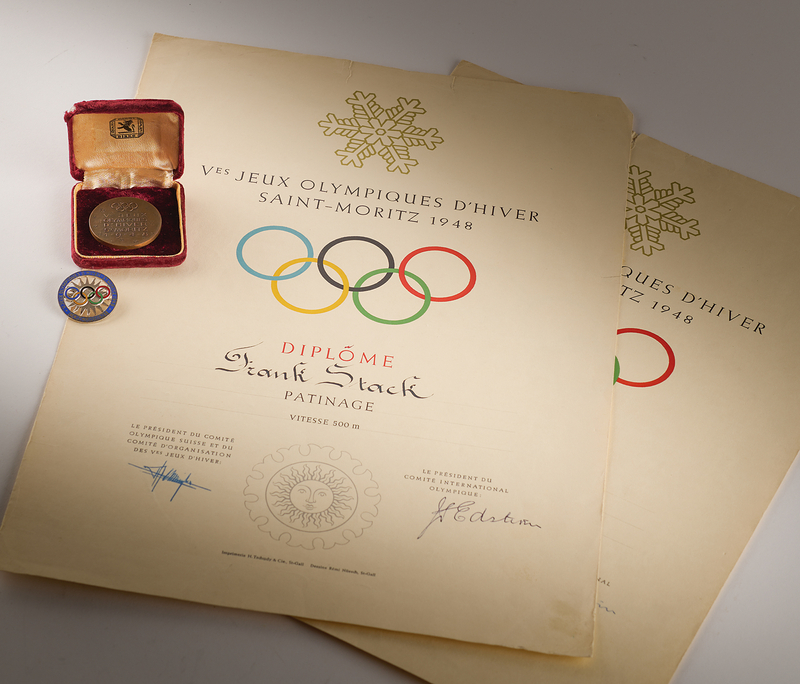 Lot 3131 St. Moritz 1948 Winter Olympics Bronze Participation Medal, Competitor's Badge, and (2) Diplomas - From the Collection of Canadian Speed Skater Frank Stack