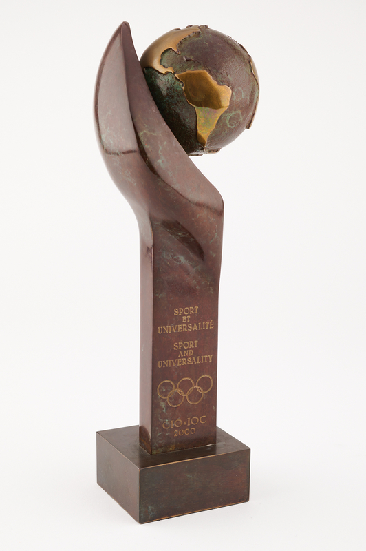 Lot 3298 International Olympic Committee (IOC) 'Sport and Universality' Marble-and-Bronze Sculpture Award by Rosa Serra