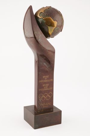 Lot #3298 International Olympic Committee (IOC) 'Sport and Universality' Marble-and-Bronze Sculpture Award by Rosa Serra - Image 1