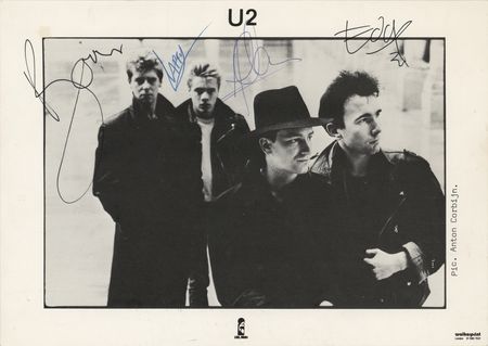 Lot #619 U2 Signed Photograph - Image 1