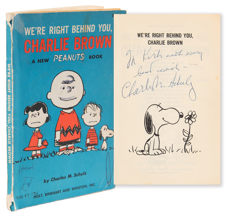 Lot 470 Charles Schulz Signed Sketch in Book - We're Right Behind You, Charlie Brown