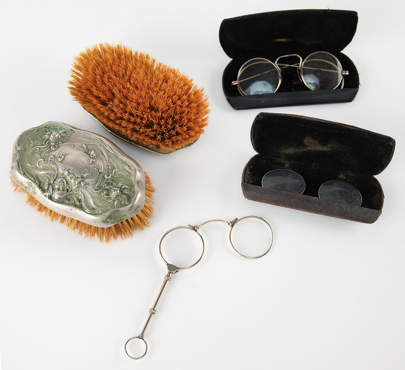 Lot 6145 Frank James's Personally-Owned Eyeglasses, Brushes, and Accessories