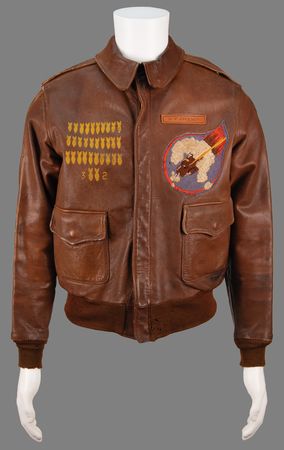 Lot #49 World War II: William F. Stuckey’s B-24 'The Dreamer' A-2 Bomber Jacket and (30) Mission-Used Bomb Fuse Pins with Military Archive Including Award Citations, Photographs, and Patches - Image 2