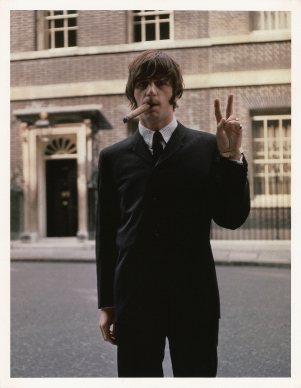 Lot 7083 Ringo Starr Photographic Print by Terry O'Neill - Cigar and Peace Sign at 10 Downing Street