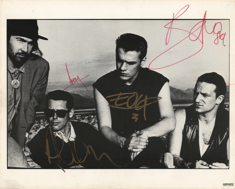 Lot 7439 U2 Signed Photograph