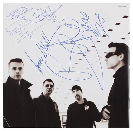 Lot #7438 U2 Signed CD - All That You Can't Leave Behind - Image 1