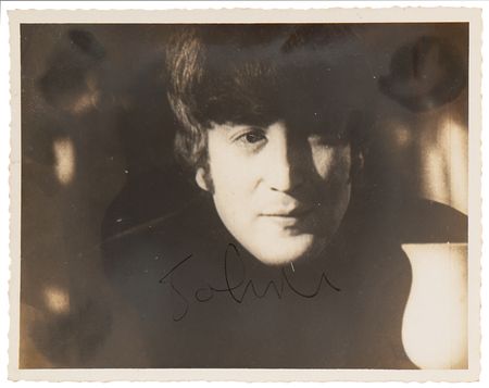 Lot #7022 John Lennon Signed Photograph - From the Collection of 'Apple Scruff' Lizzie Bravo - Image 1