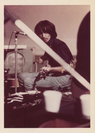 Lot #7072 George Harrison Vintage Candid Photograph by Linda McCartney (1969) - Image 1
