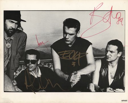 Lot #7439 U2 Signed Photograph - Image 1