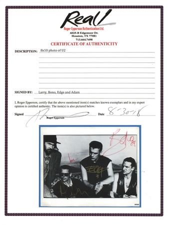 Lot #7439 U2 Signed Photograph - Image 2