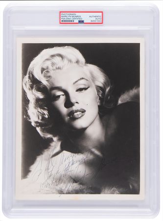 Lot #414. Marilyn Monroe Signed Photograph - "It&rsquo;s a pleasure to work with you"
