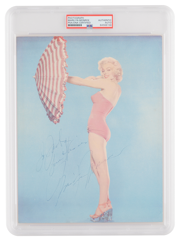 Lot 632 Marilyn Monroe Signed Photograph - Rare Color Bathing Suit Portrait