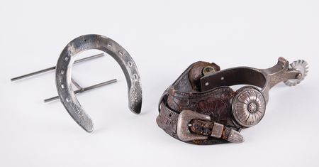 Lot #735. John Wayne's Screen-Worn Bohlin Hollywood Spur