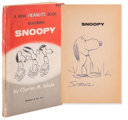 Lot #336 Charles Schulz Signed Book with Sketch of Snoopy - Image 1