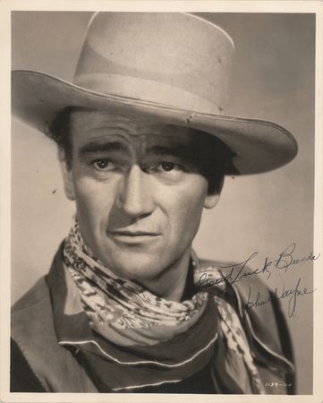 Lot #734. John Wayne Signed Photograph