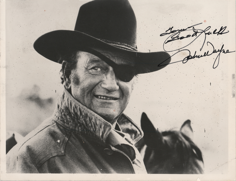 Lot 561 John Wayne Signed Photograph as Rooster Cogburn from True Grit