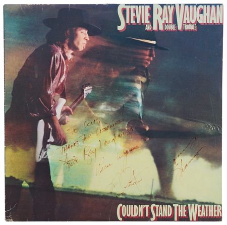 Lot #496 Stevie Ray Vaughan and Double Trouble Signed Album - Couldn't Stand the Weather - Image 1